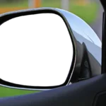 Person inspecting a used car interior with open doors and a flashlight near damp seat seams